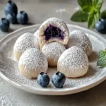 Blueberry-Filled Almond Snowball Cookies for Sweet Bliss First Image First Image